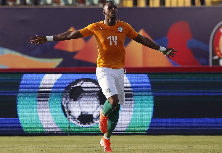 Jonathan Kodjia celebrates his goal that helped Ivory Coast to win the Africa Cup of Nations