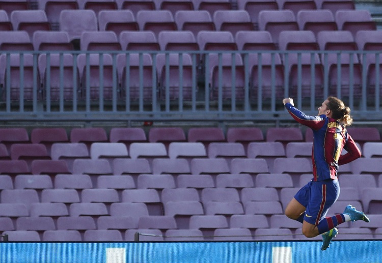 Antoine Griezmann celebrates his second goal in Barcelona's 4-0 win over Osasuna in La Liga
