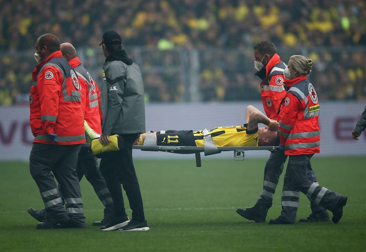 Dortmund captain Marco Reus has suffered an injury during their Bundesliga match against Schalke 04