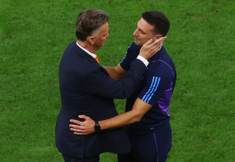 Argentina head coach Lionel Scaloni greets Netherlands manager Louis van Gaal in their World Cup 2022 quarter-final match