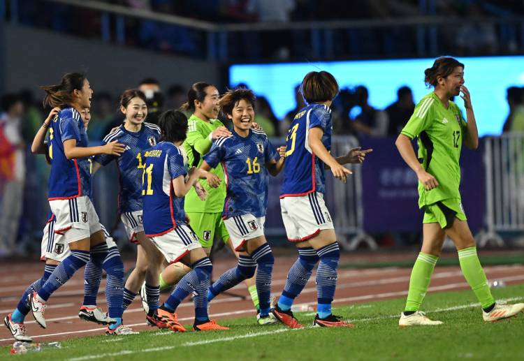 Japan defeated South Korea 4-1 to claim the gold medal in women's football at the Asian Games